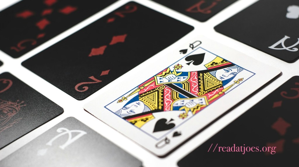 Queen of Spades book review by Joe Kucharski. Photo by Esteban Lopez for unsplash
