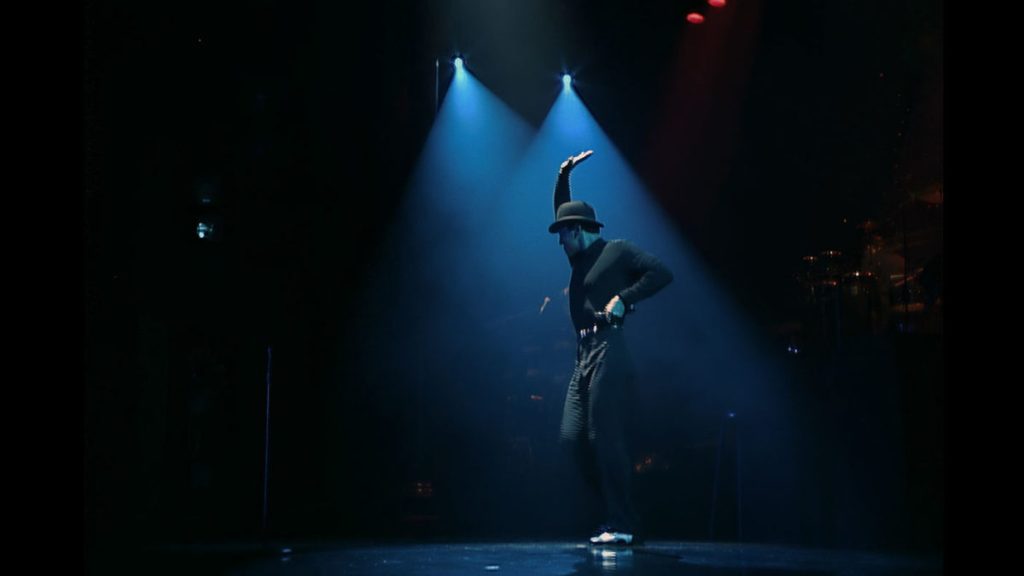 Danny Gans onstage in Voices